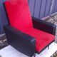 Black leatherette armchair and red fur