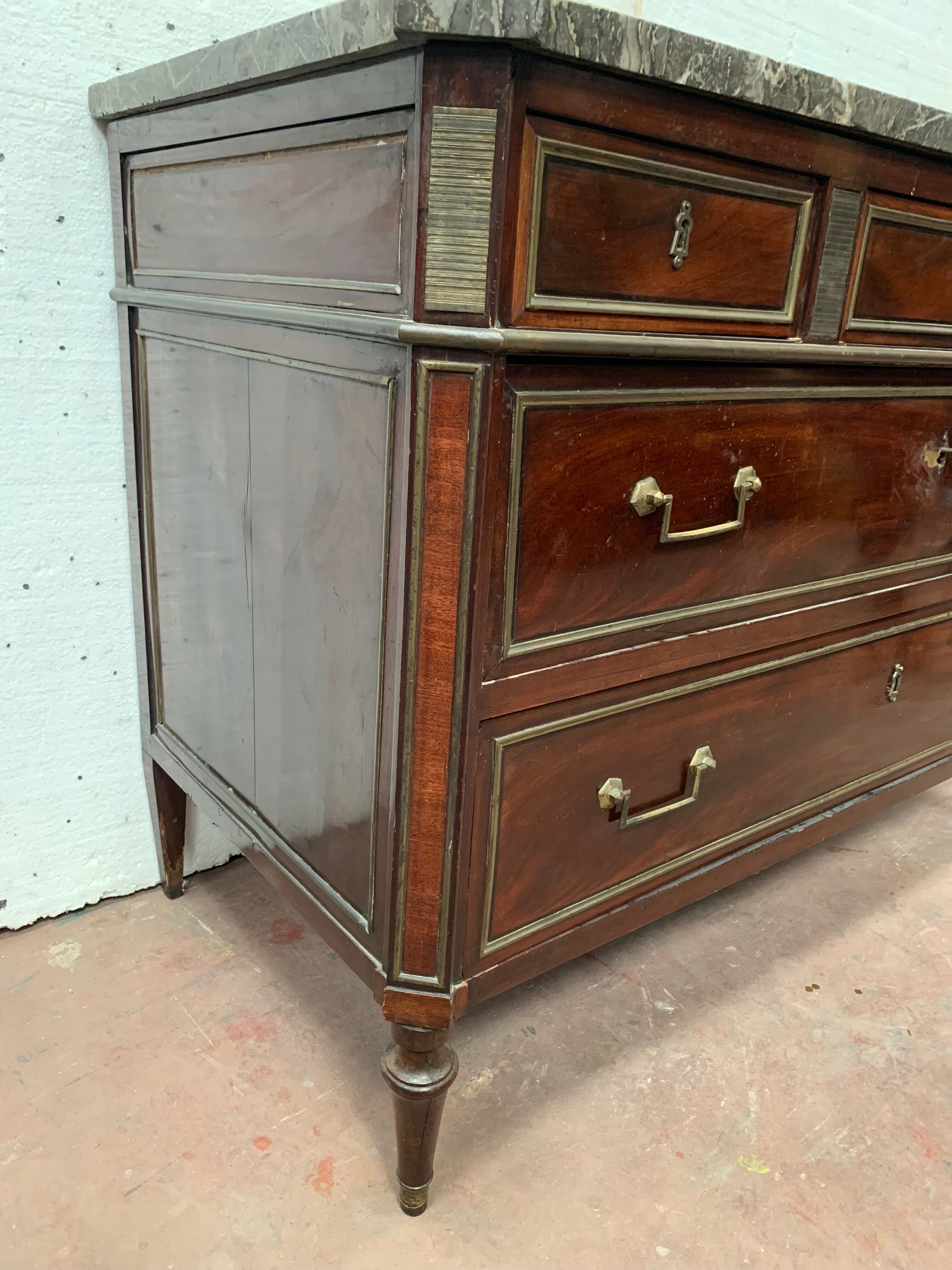 Commode style Lois XVI in mahogany Top of veined gray marble XIX century