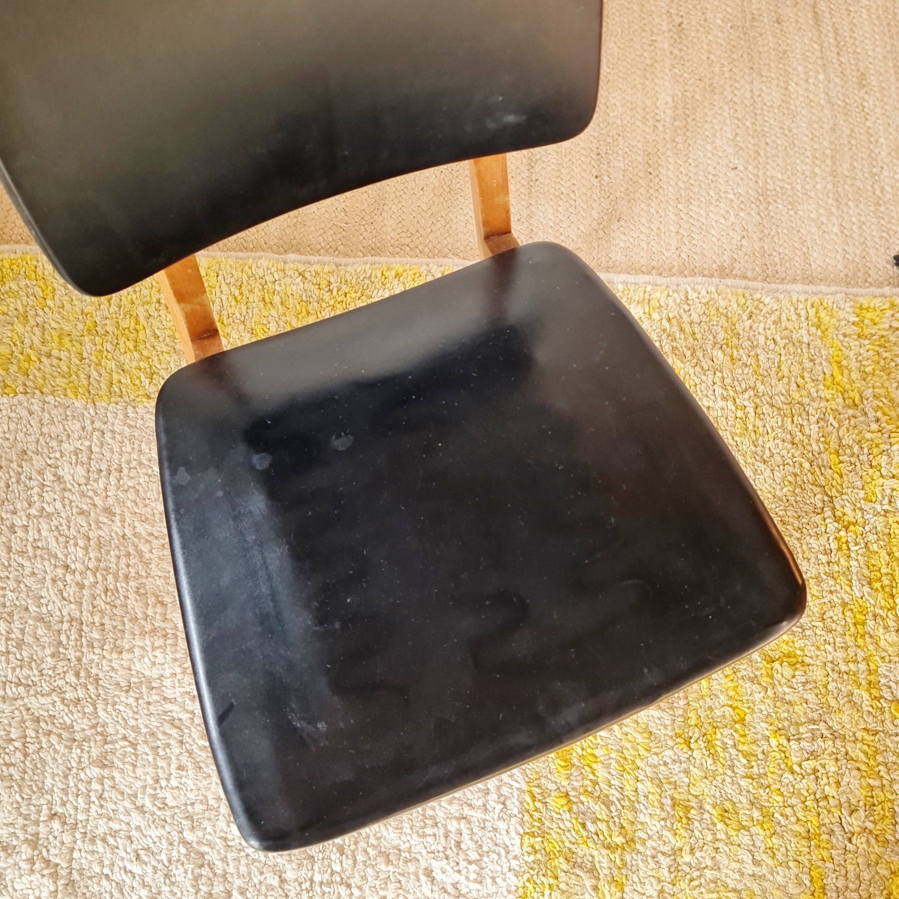 Vintage Scandinavian chair with compass legs.