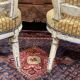 Pair of Louis XVI period cabriolet chairs in beech.