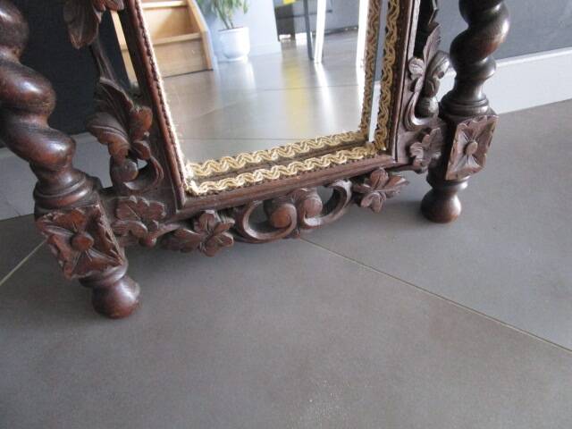 Antique carved wooden mirror
