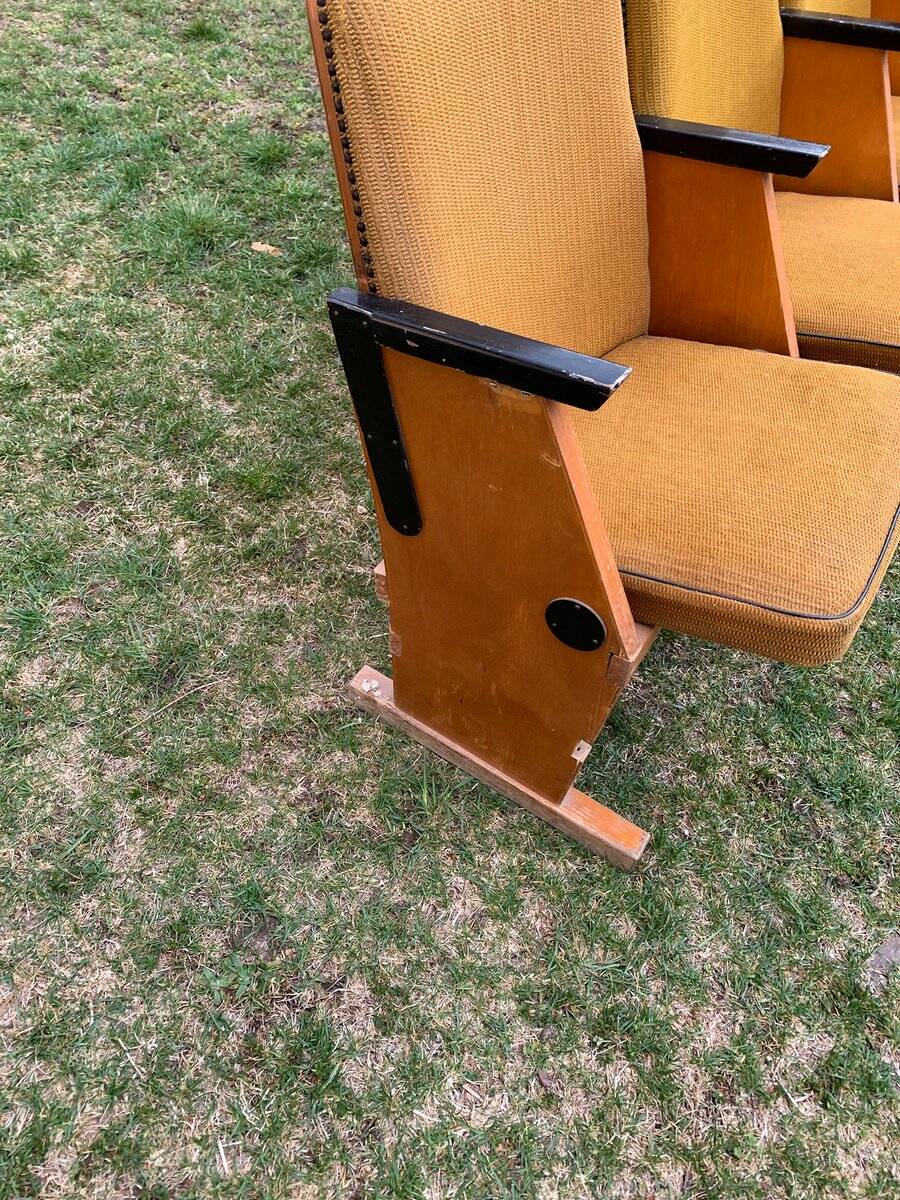 Set of 4 mid-century cinema seats in yellow fabric and light wood, 1950s.
