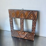 Double frame intricately carved wood