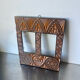Double frame intricately carved wood