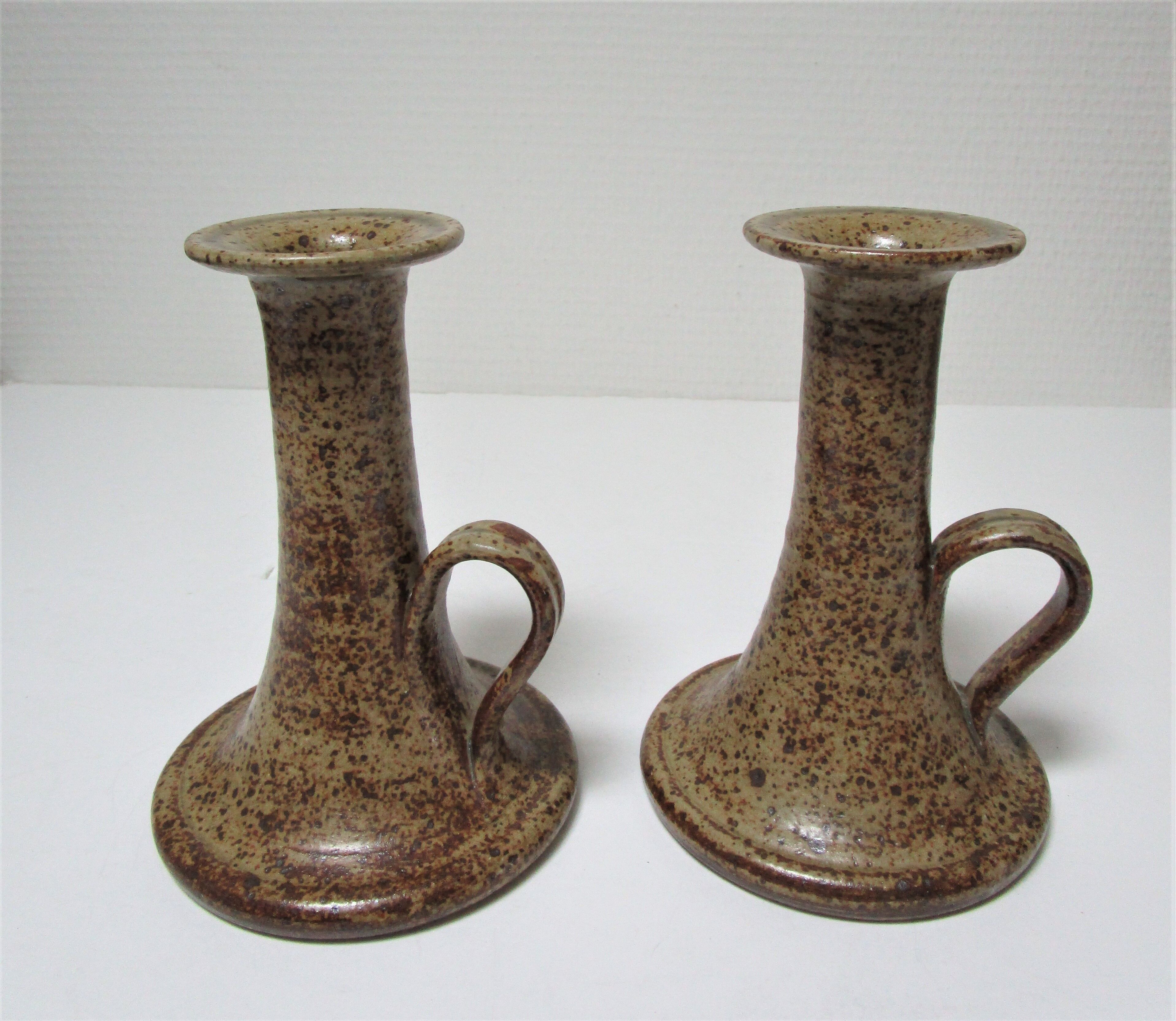 Pair of vintage sandstone candlesticks