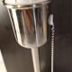 Modern white nickel lamp base with pull switch.