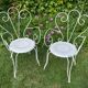 Paire d’anciens fauteuils de jardin en fer forgé