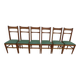 6 modern chairs with banded backs and green faux leather seats.
