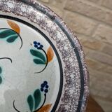 Old plate with brown border and flowers called black bottom