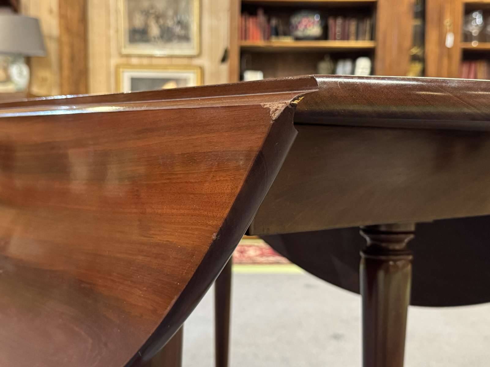 19th-century Louis XVI dining table in Cuban mahogany.