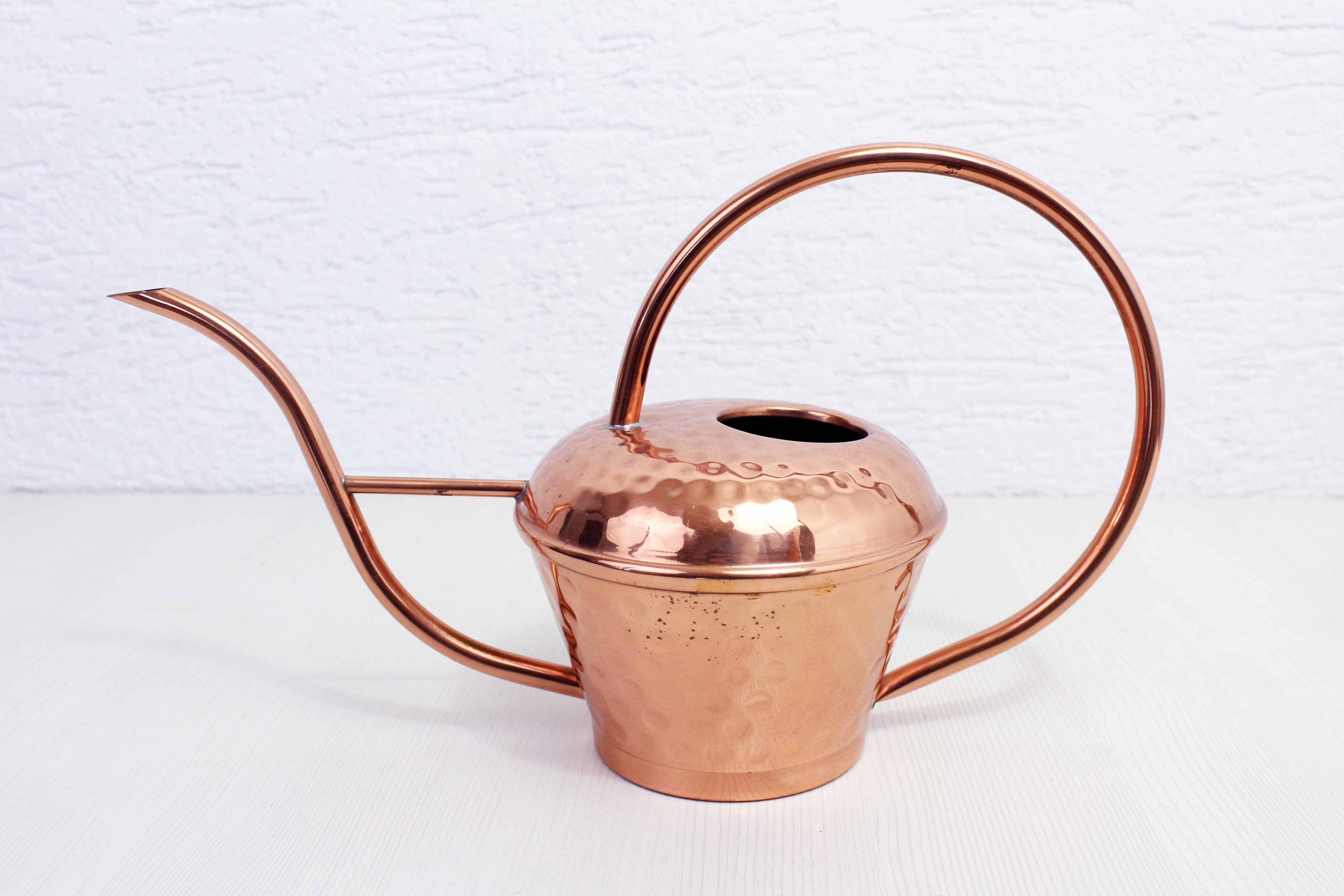 Vintage copper watering can