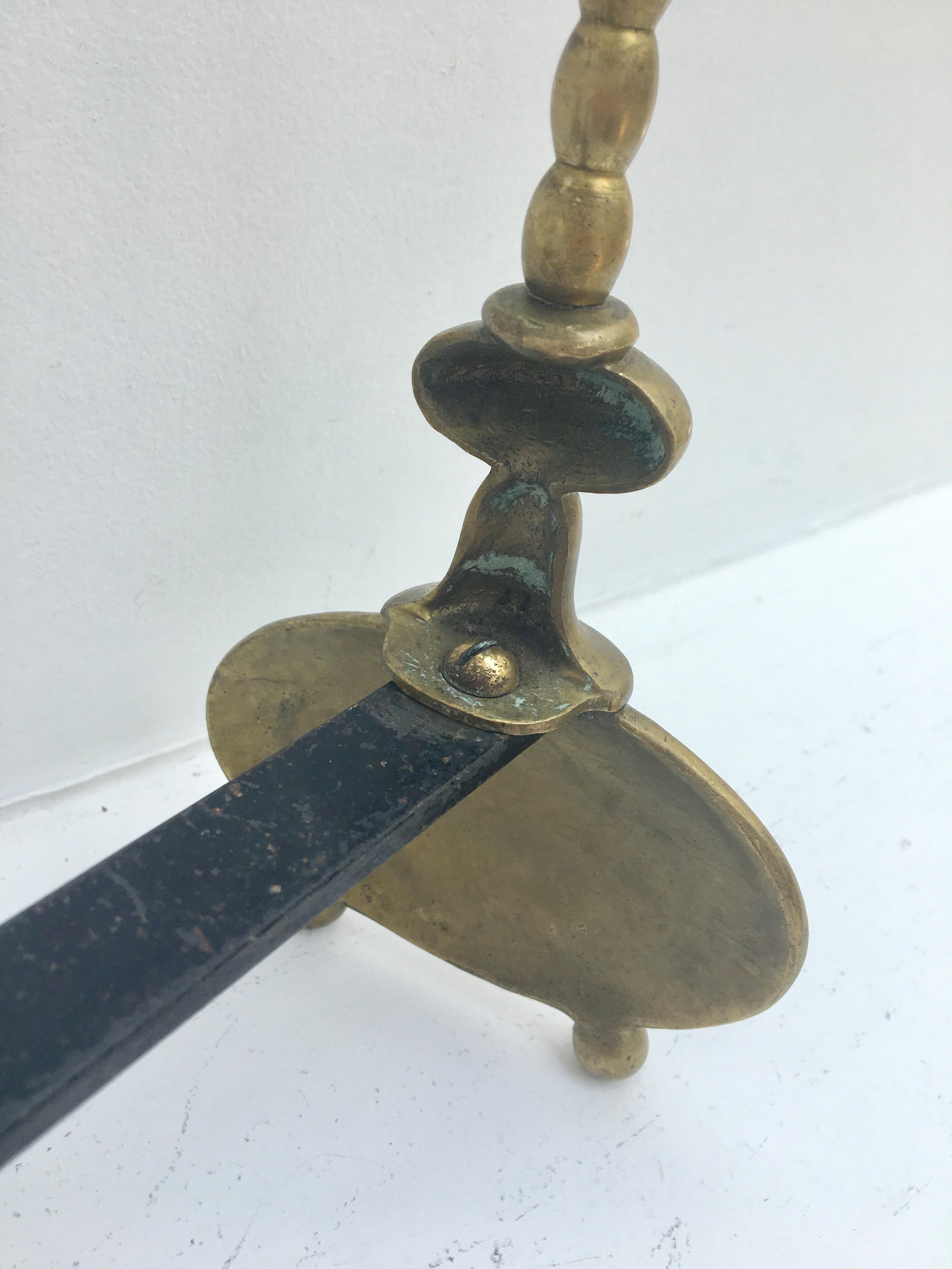 Pair of andirons in brass for fireplace