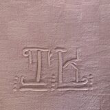 Duo set, consisting of two large pink-dyed cotton and linen towels, embroidered, TK monograms