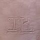 Duo set, consisting of two large pink-dyed cotton and linen towels, embroidered, TK monograms