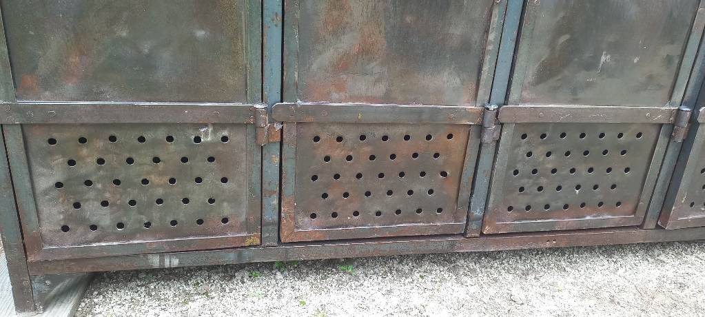 Very old riveted 5-door locker room