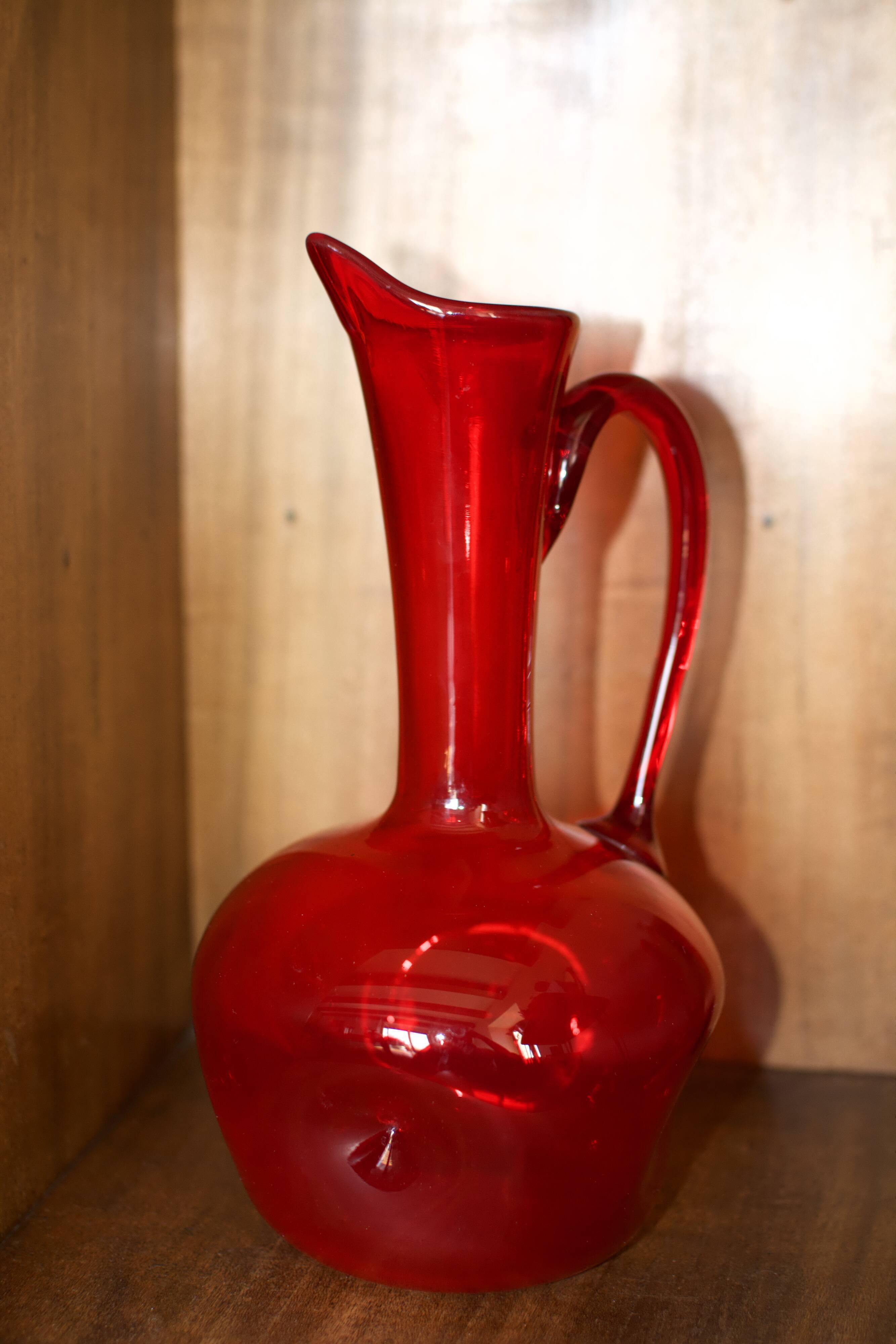 Pair of vintage blown glass pitchers