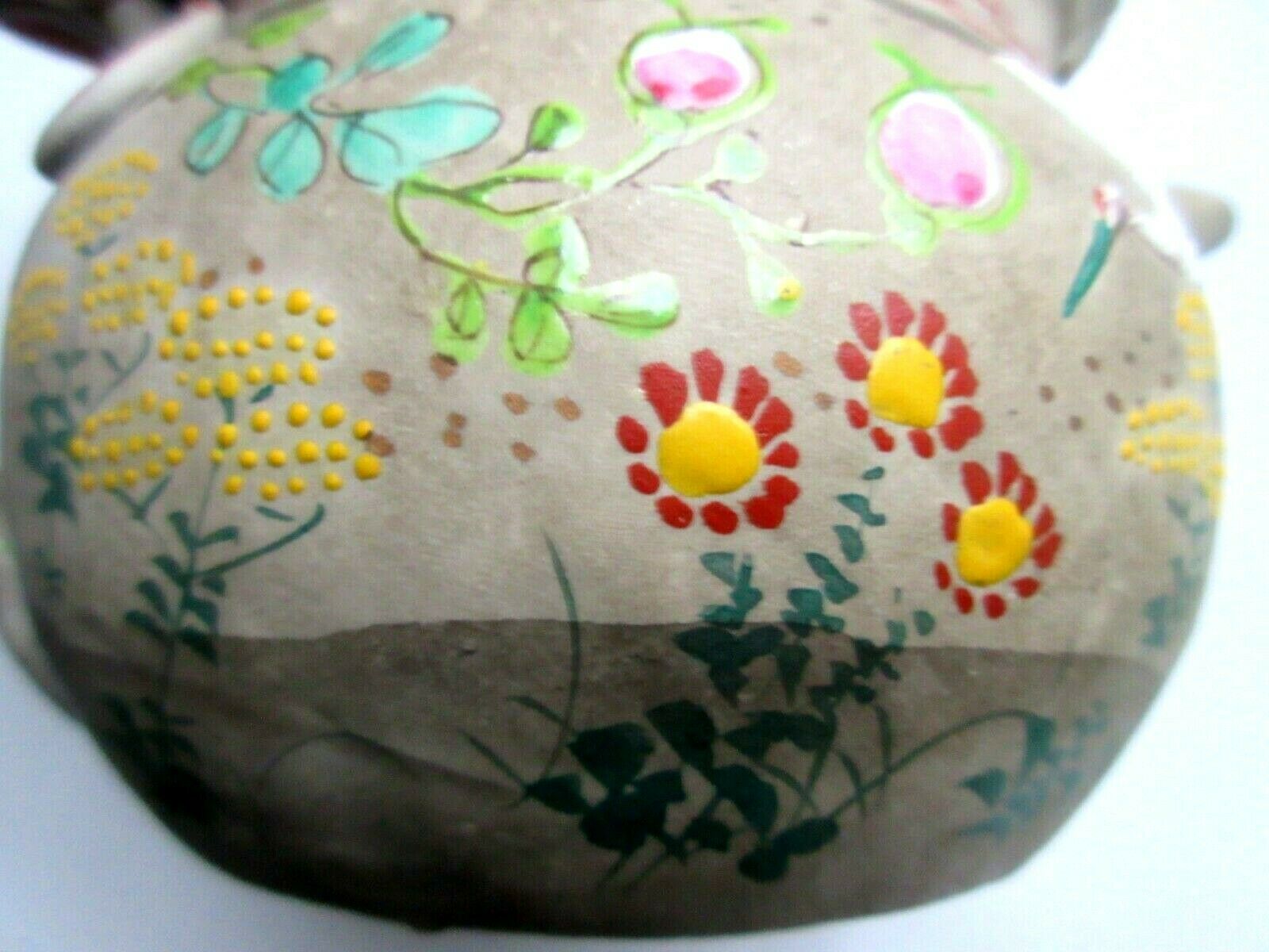 Japanese Art Deco teapot in porcelain biscuit enamelled with cranes and flowers