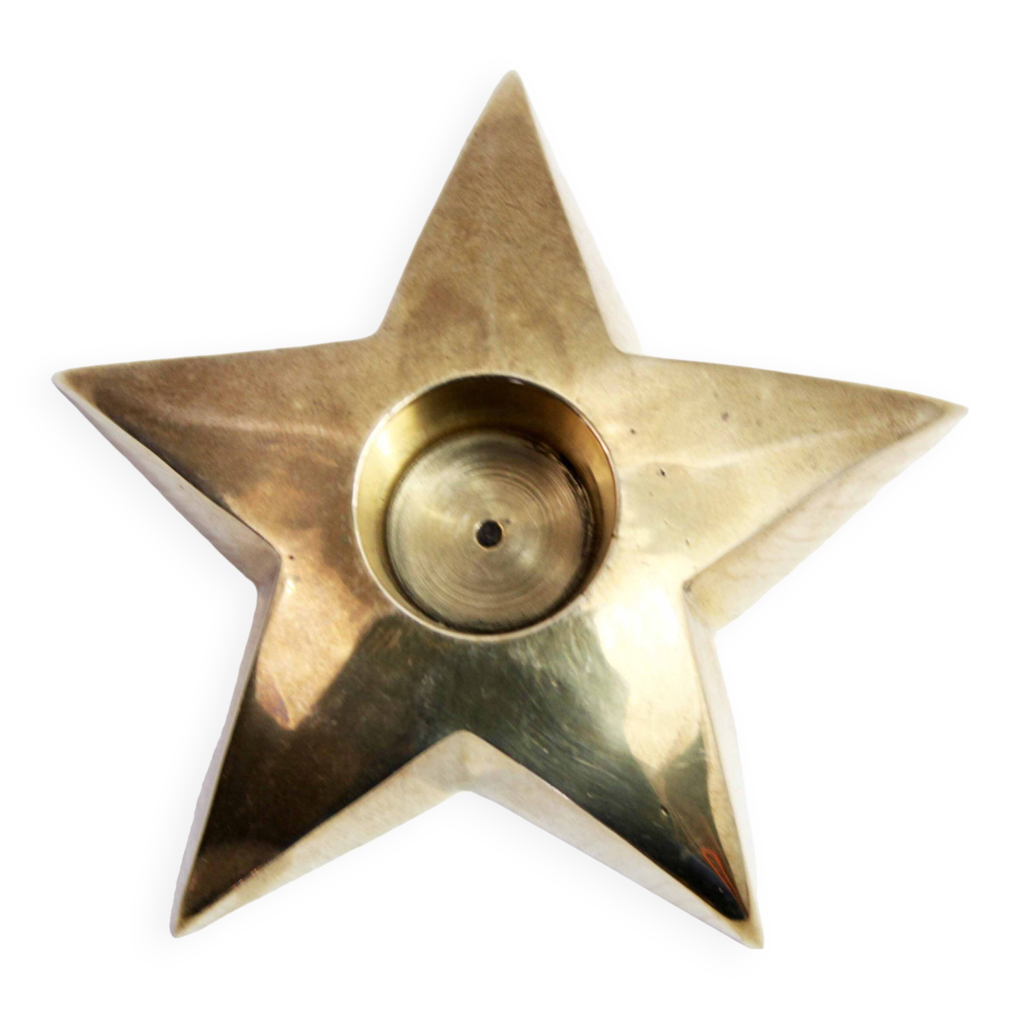 Star-shaped brass candle holder
