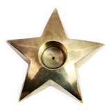 Star-shaped brass candle holder