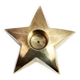 Star-shaped brass candle holder