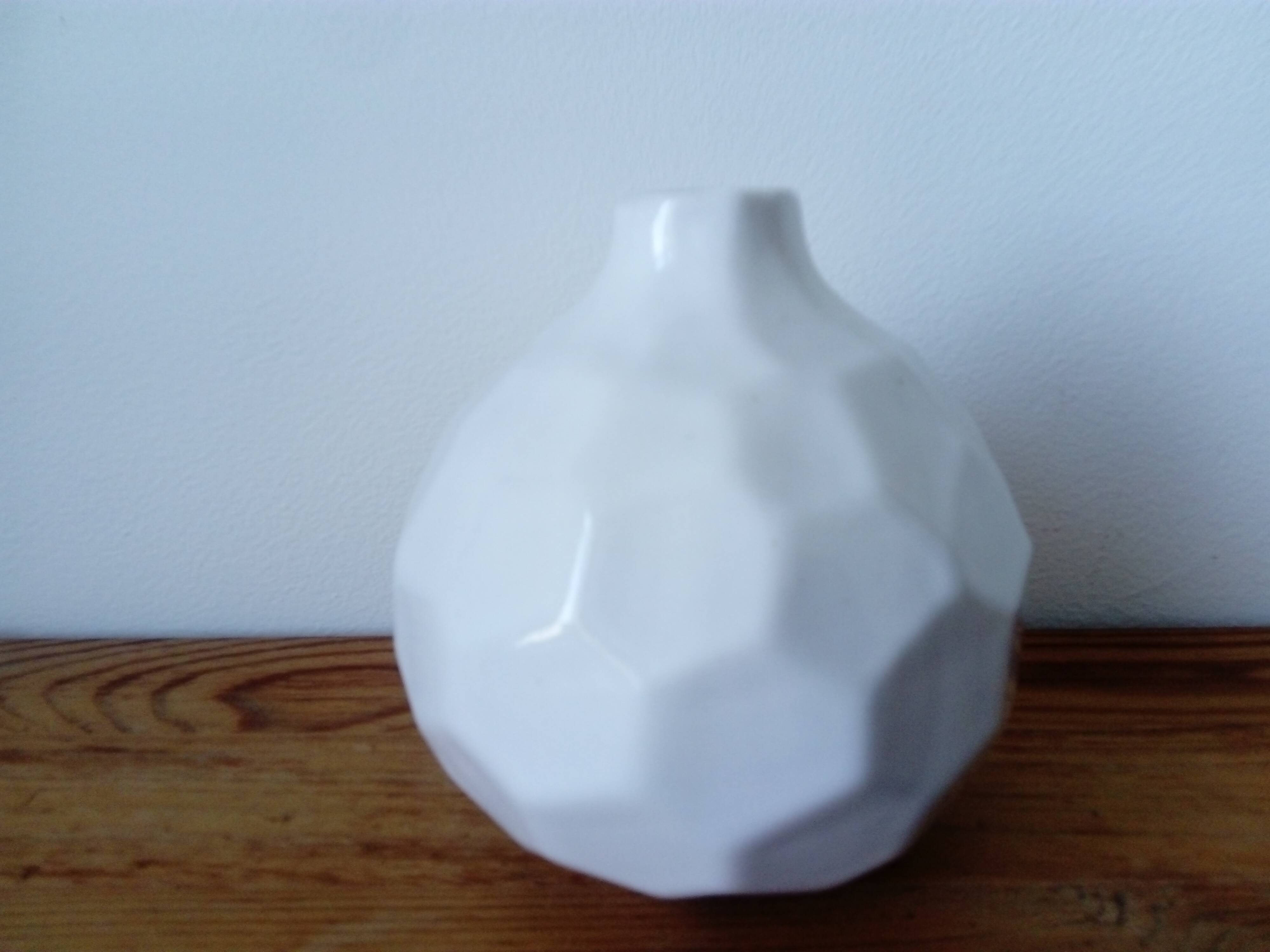 white ceramic faceted design vase