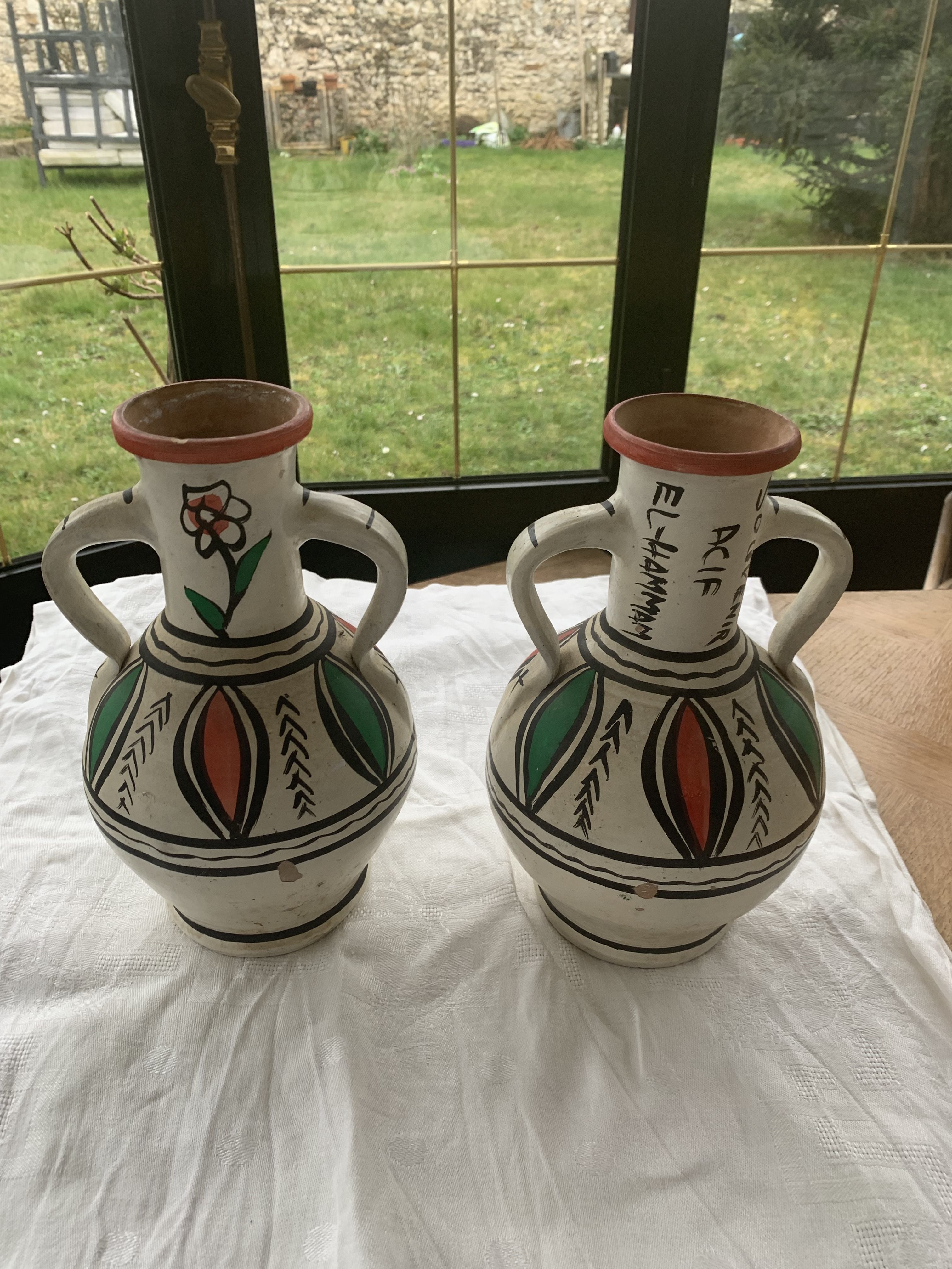 Pair of amphora vase, vintage artisanal and oriental pottery