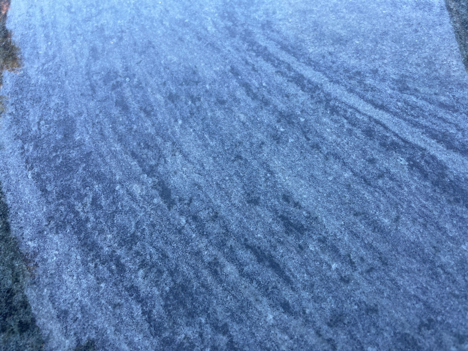 Round dining table with green marble and solid brass.