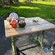 Old table with patinated green legs