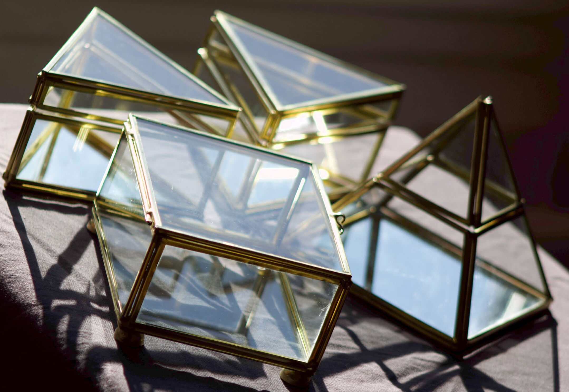 4 old glass, brass and mirror jewellery boxes