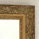 Small old mirror in gilded wood