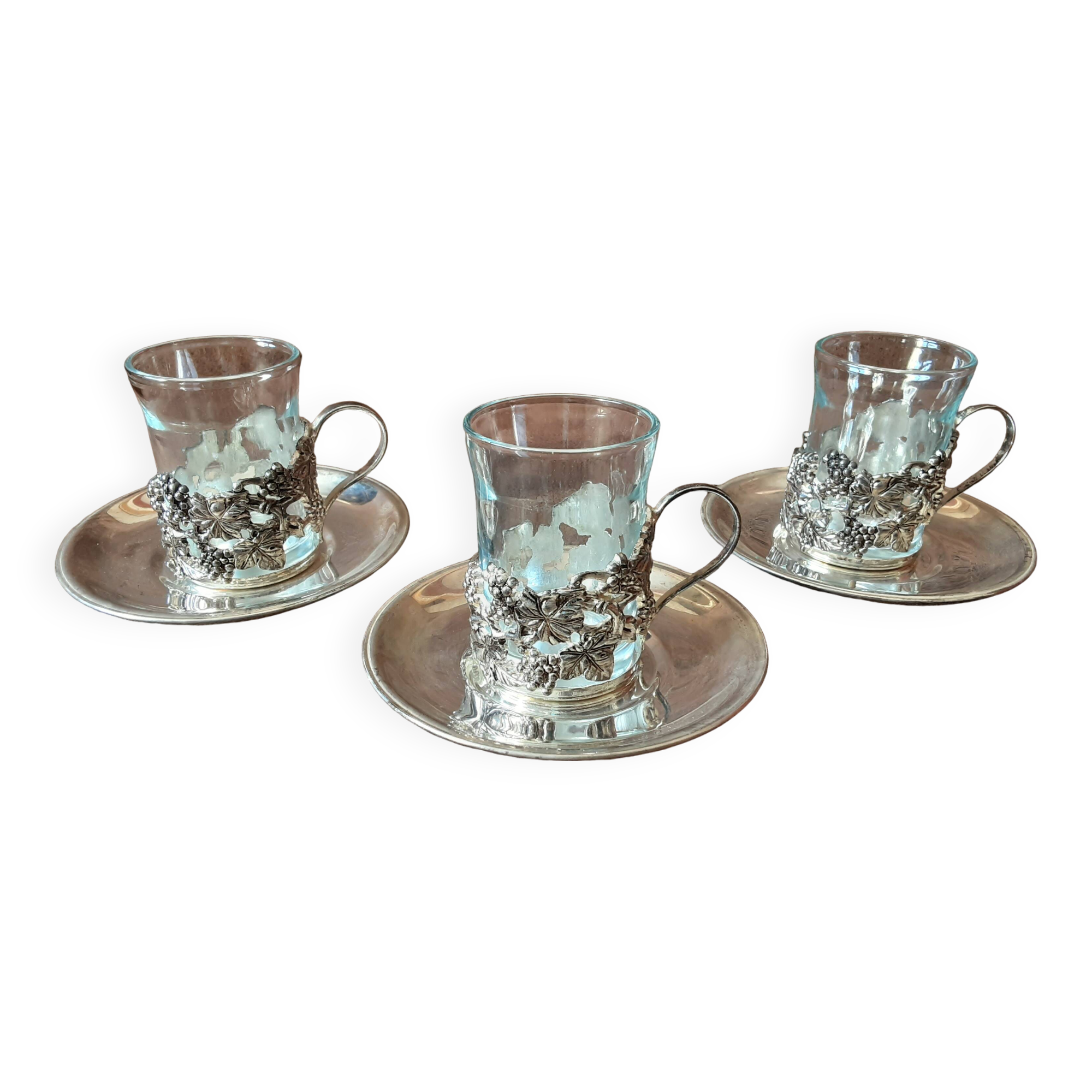Set of 3 small metal glasses and saucers