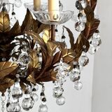 Chandelier with tassels and golden brass