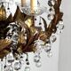 Chandelier with tassels and golden brass