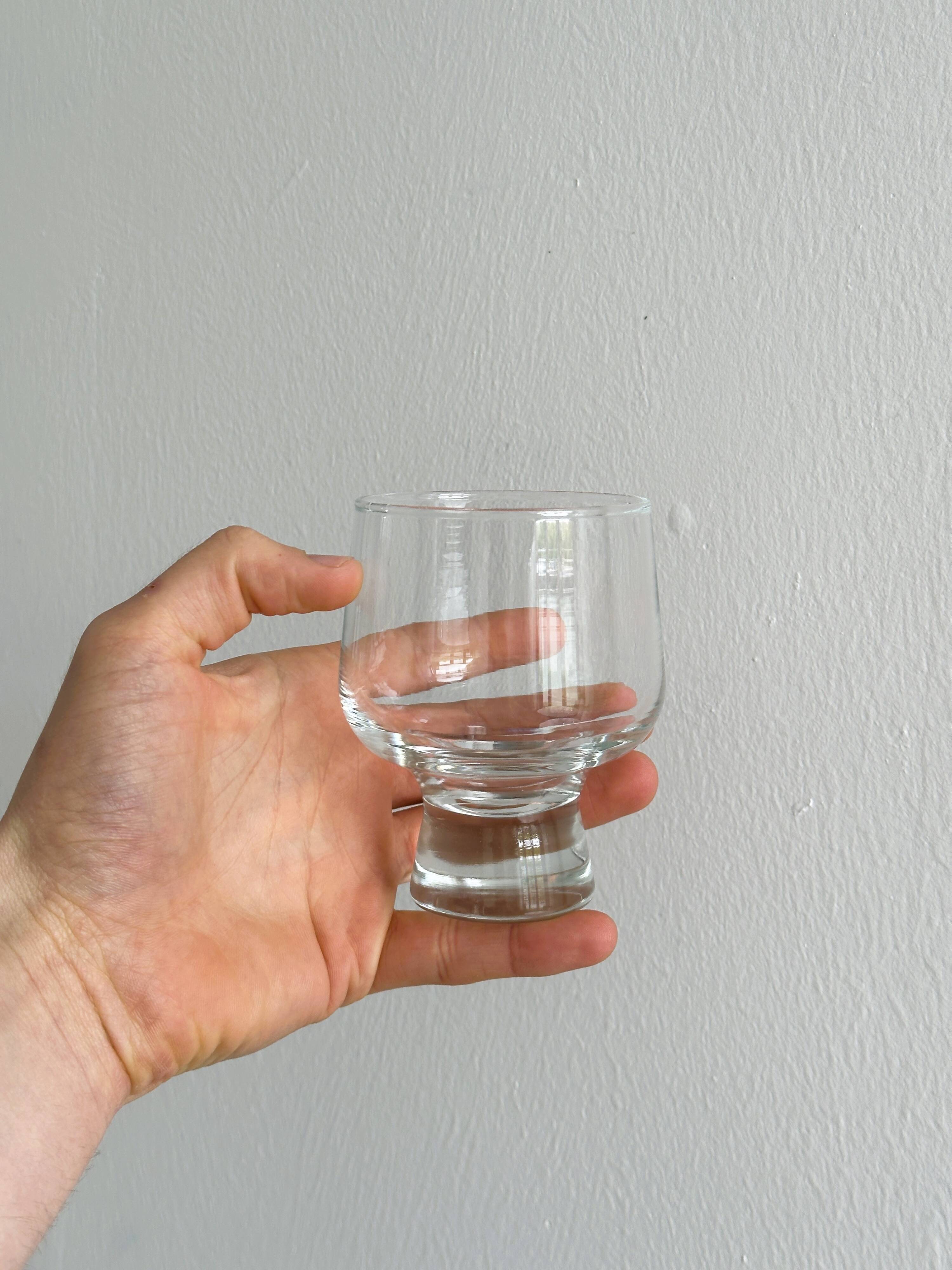 5 thick glass water glasses.