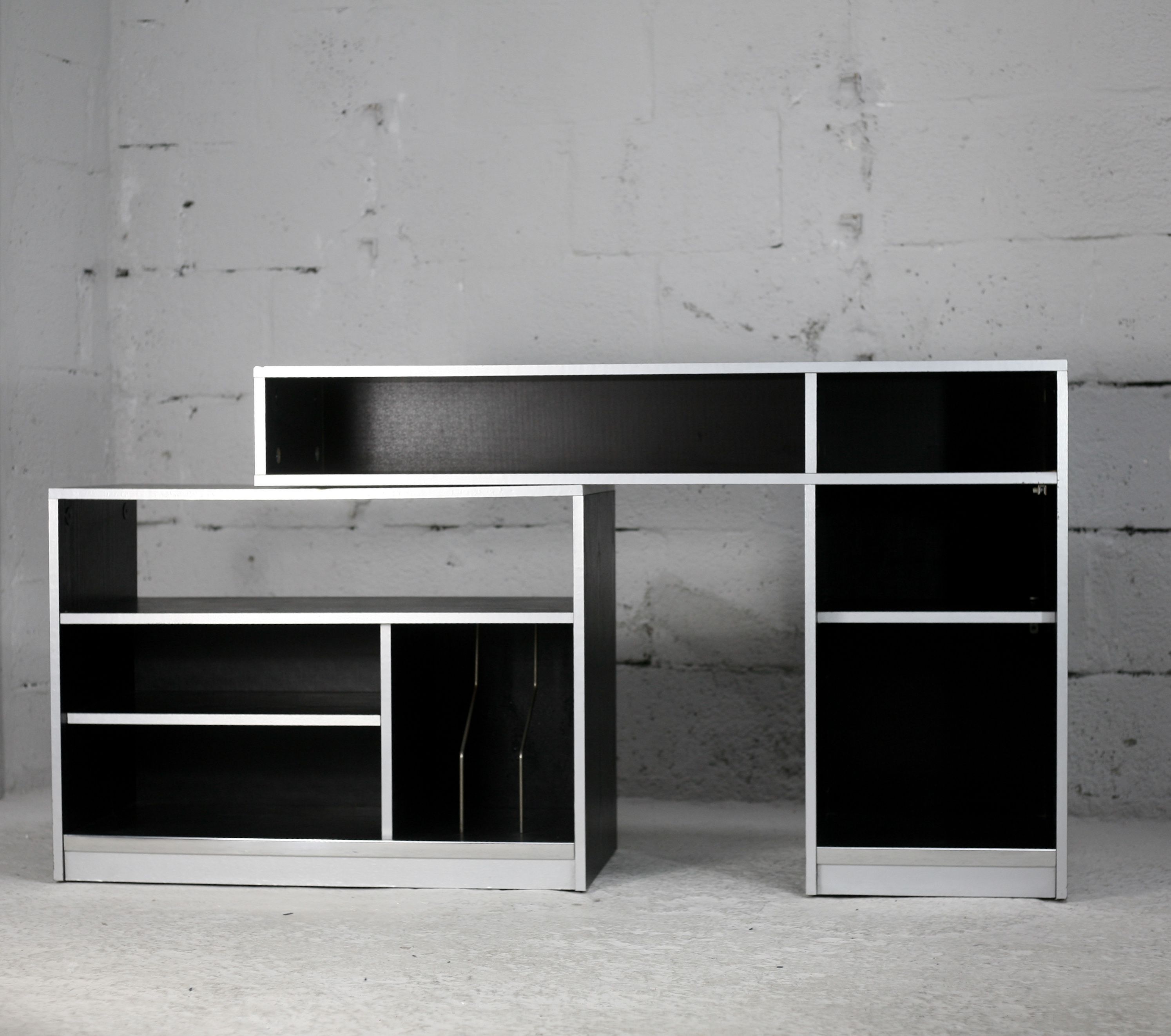 Storage cabinet wood compressed lacquered black lining margins aluminum. France, circa 1975.