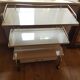 Rolling serving table with drawer