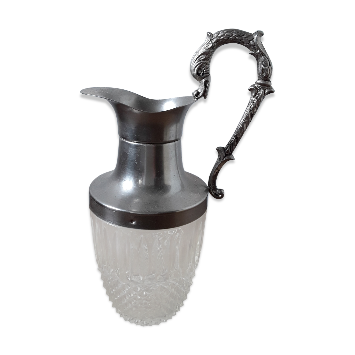 Old glass and silver metal wine carafe