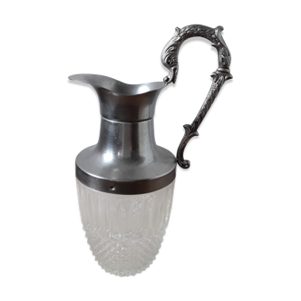 Old glass and silver metal wine carafe