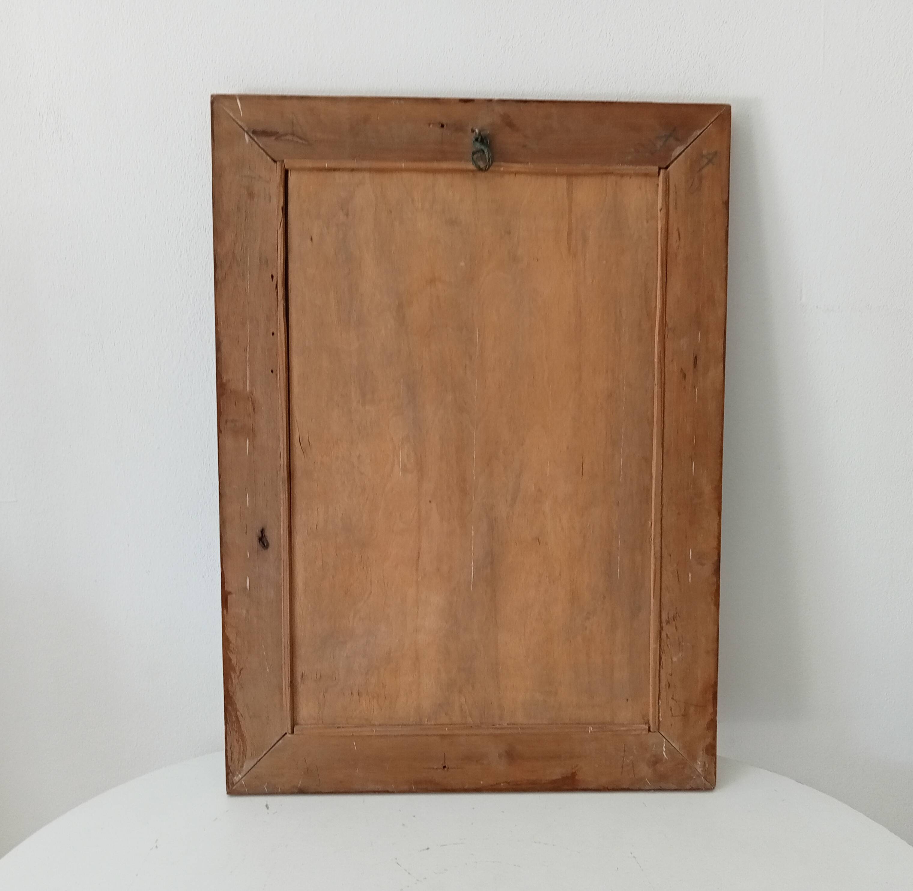 Vintage Art Deco wooden mirror from the 1950s.