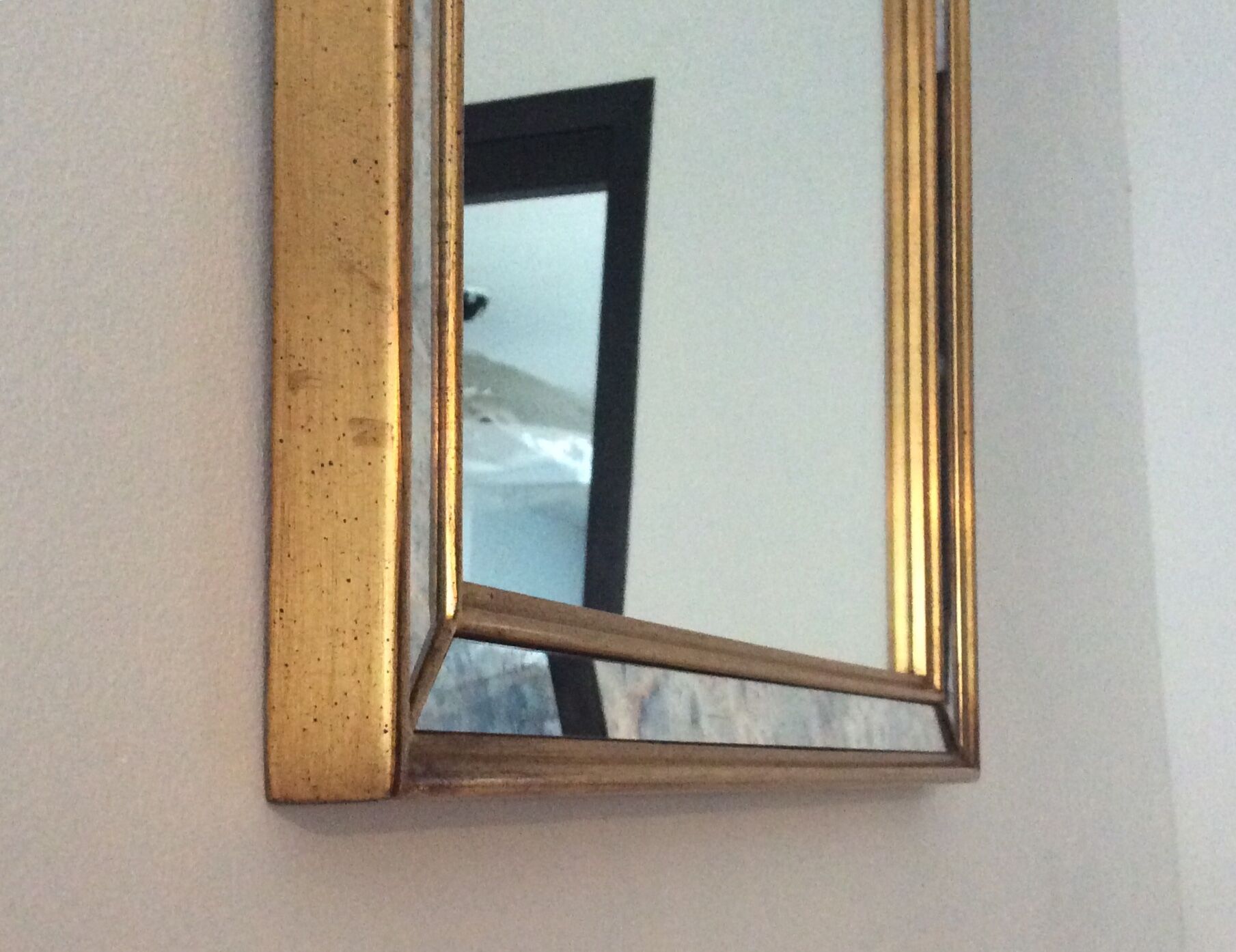 Miroir doré à  parcloses Deknudt des années 70