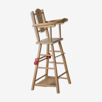 High chair doll in vintage wood
