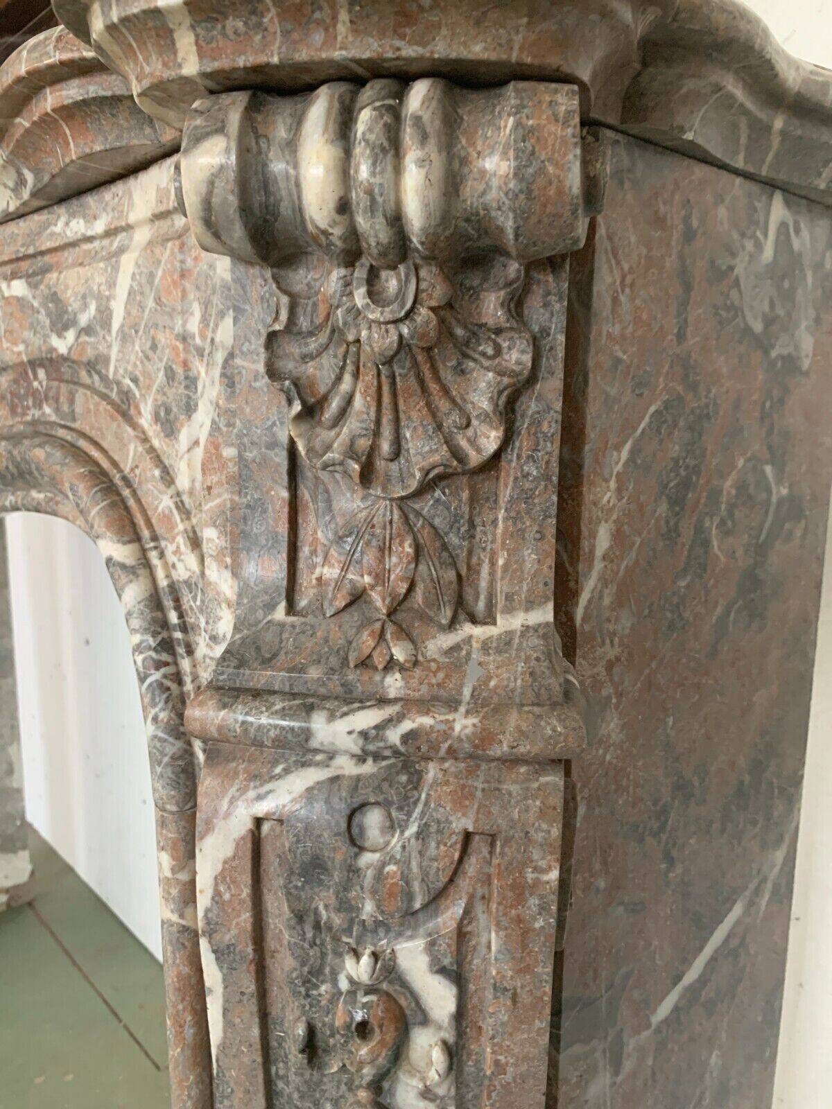 Louis XV style fireplace in red breche marble 19th century