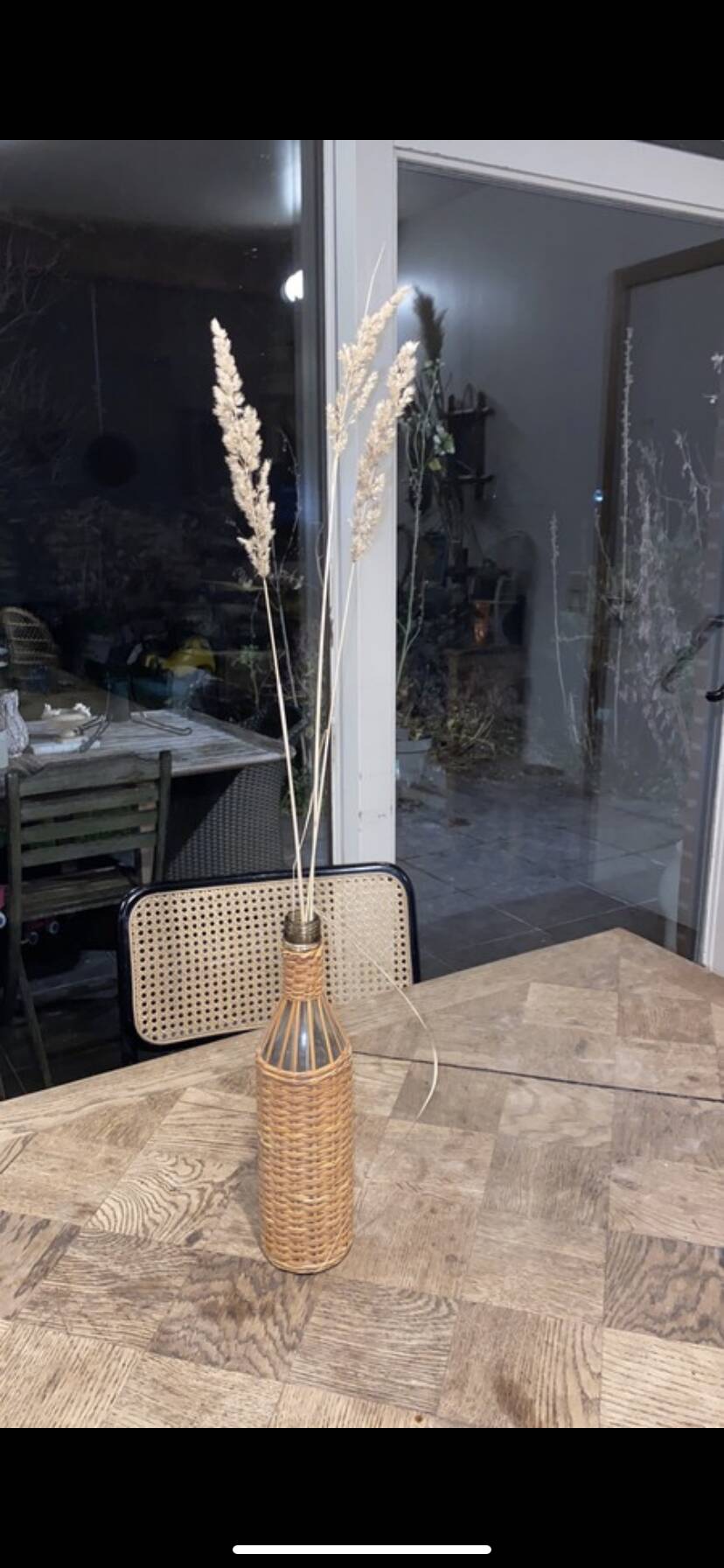 Bottle surrounded wicker