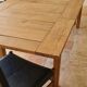 Extendable farmhouse table in solid oak, renovated.