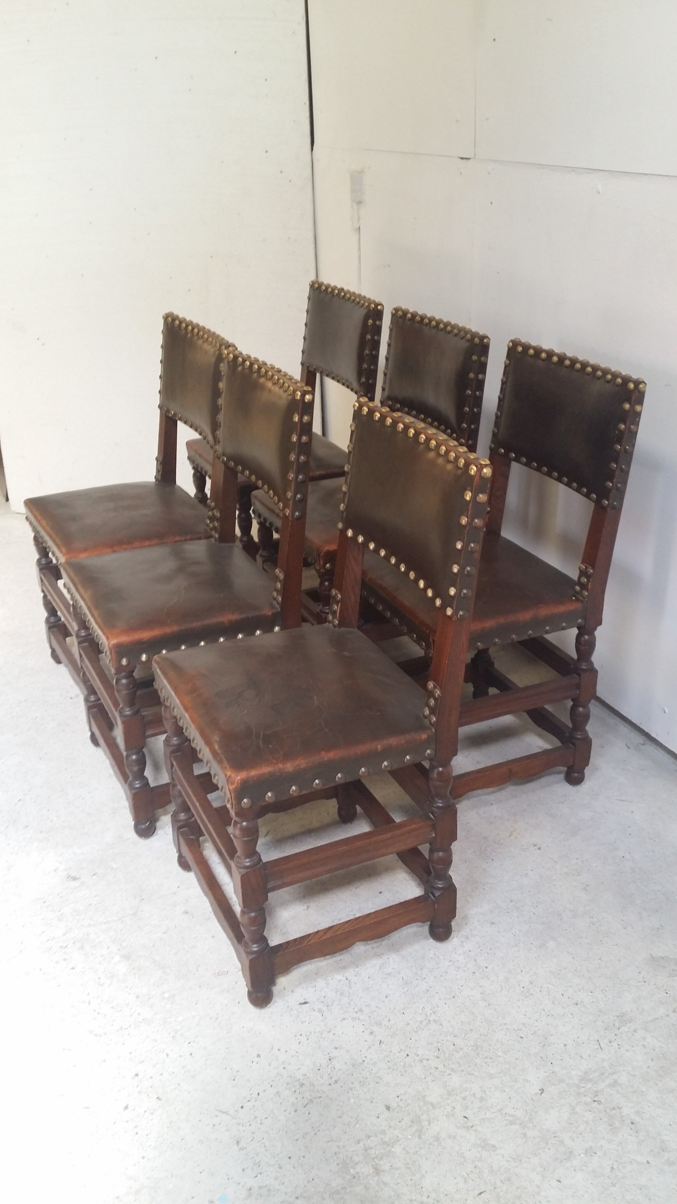 a set of six leather chairs and nails