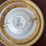 Porcelain plates and bowls of Limoges gold decoration