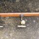 Large vintage wall coat rack with 5 brass and wood hooks – bistro