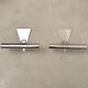 Pair of stainless steel wall lights 1980