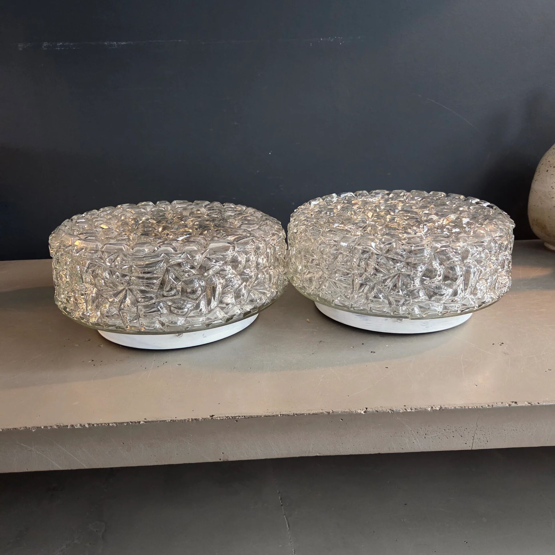 Pair of ceiling lights or moulded glass wall lights.