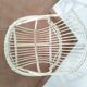 Fauteuil coquille en rotin blanc